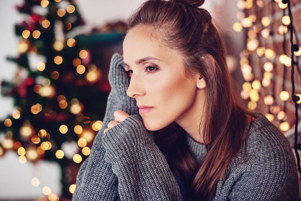 Person depressed on Christmas in need of counseling