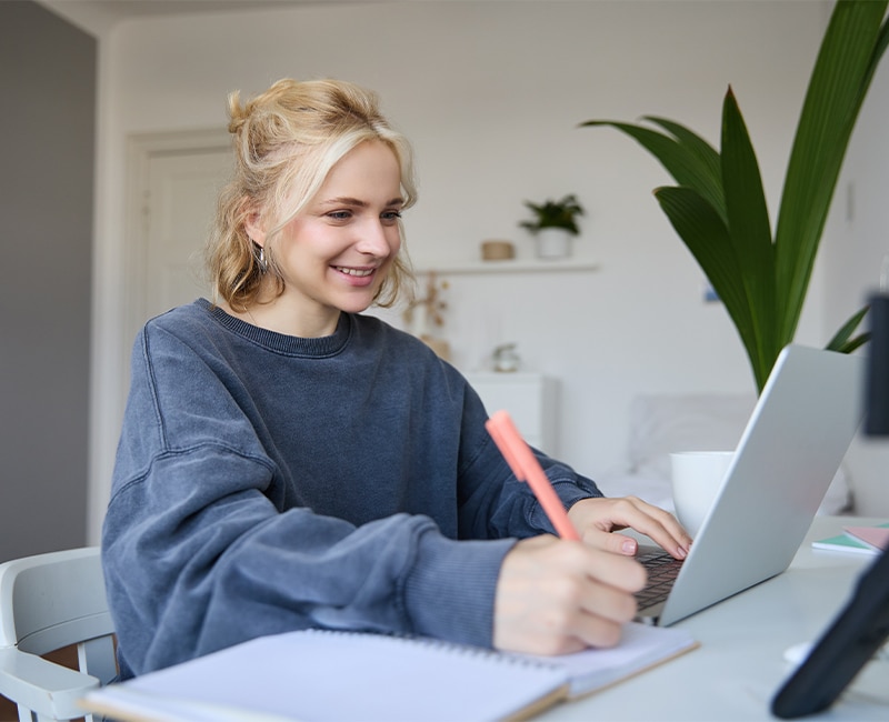 Portrait of young blond smiling woman, studying a master of counselign online